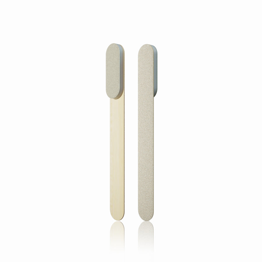 Double-sided buff file with two slim rectangular sanding pads, light gray and cream